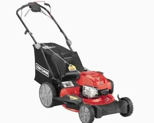 Walk-behind lawn mower with grass collection bag, available for rent at McKinleyville Ace Home & Garden Center.