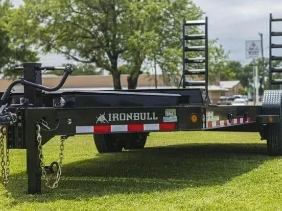 20-foot equipment trailer with loading ramps and dual axle design for transporting machinery, available for rent at McKinleyville Ace Home & Garden Center.