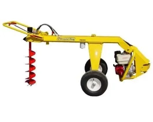 Towable hydraulic earth auger with gas engine and spiral drill bit for digging post holes, available for rent at McKinleyville Ace Home & Garden Center.
