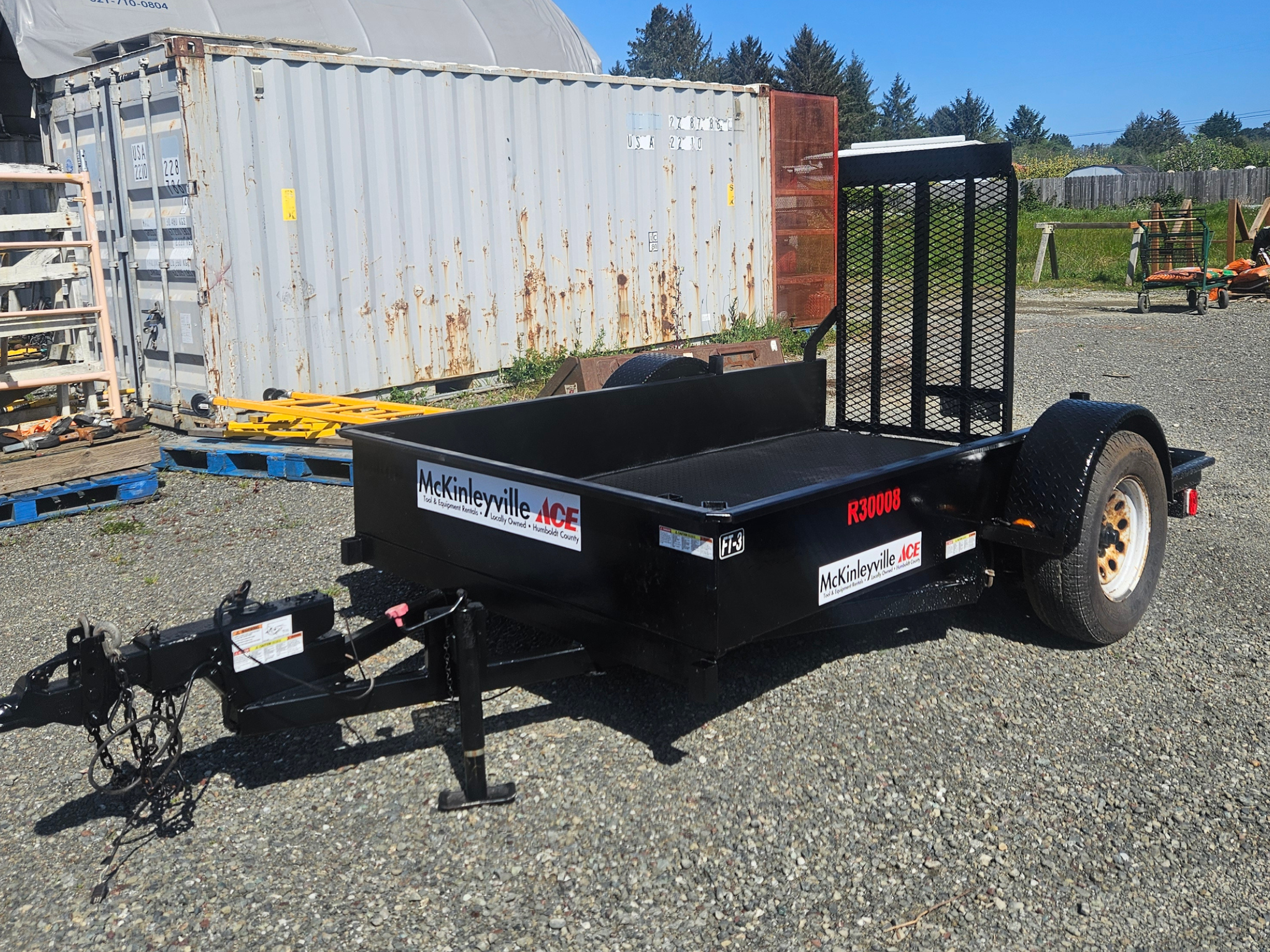5x8 aluminum utility trailer with single axle and open flatbed for hauling equipment, available for rent at McKinleyville Ace Home & Garden Center.