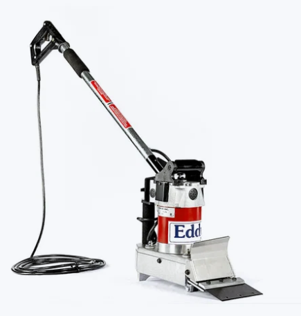 Electric floor scraper for removing tile, vinyl flooring, carpet adhesive, and other floor coverings during renovation and flooring projects.