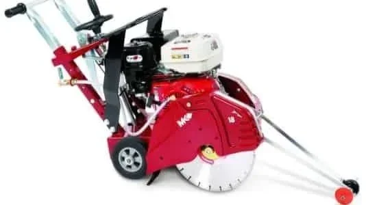 Walk-behind concrete saw with large circular blade for cutting concrete and asphalt, available for rent at McKinleyville Ace Home & Garden Center.