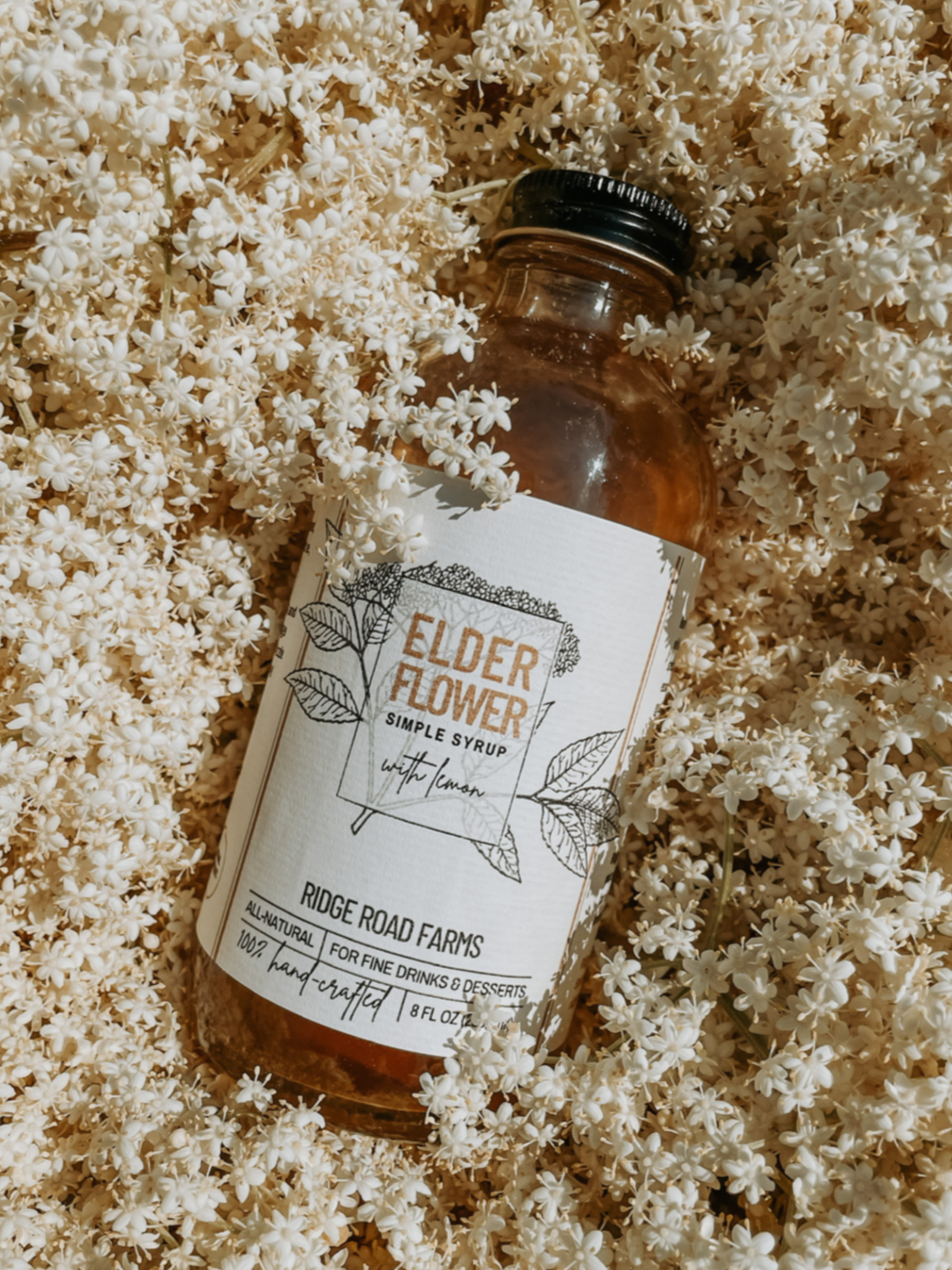 Bottle of elderflower syrup