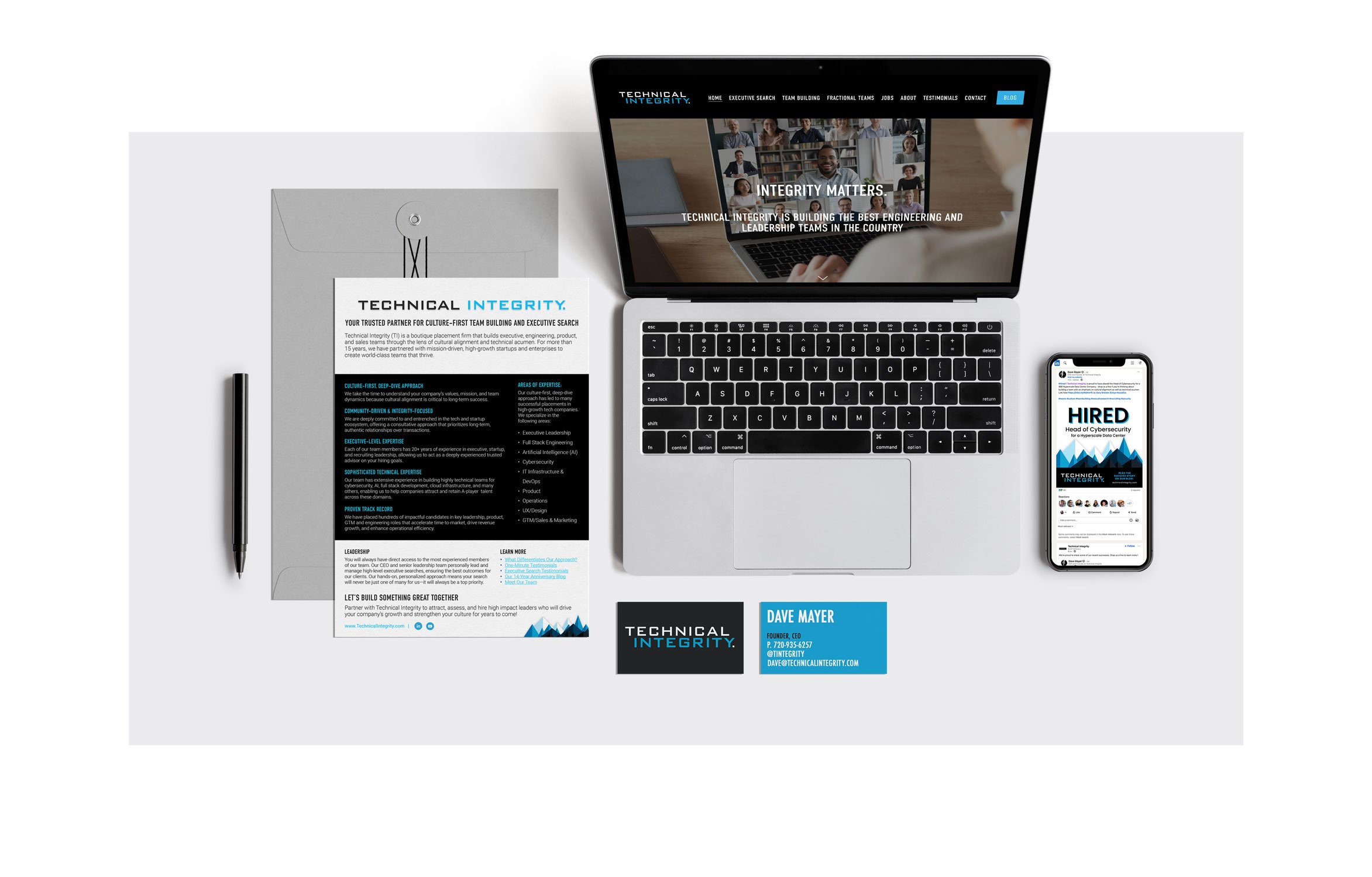 A laptop computer displaying the Technical Integrity website on its screen, a smartphone showing one of their 'HIRED' social media posts, their businesses cards and a one-page flyer about the company. This image shows brand consistency.