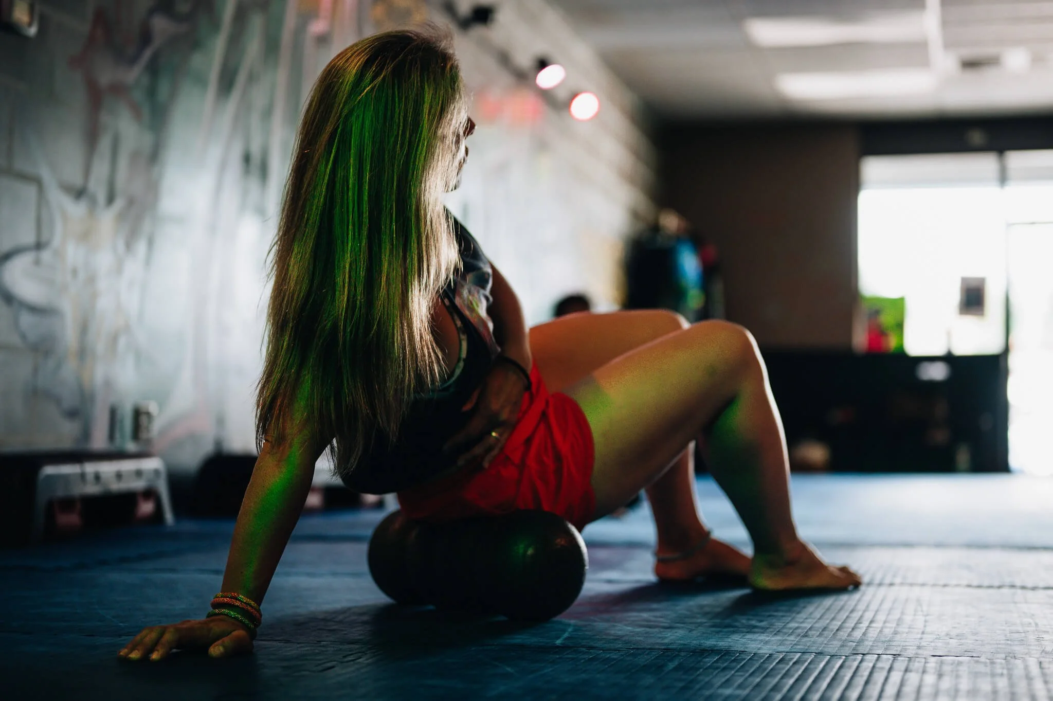 Warrior Flow mobility training at WildStyle Gym in Snohomish, WA, using a Rollga roller to improve flexibility, recovery, and body awareness.