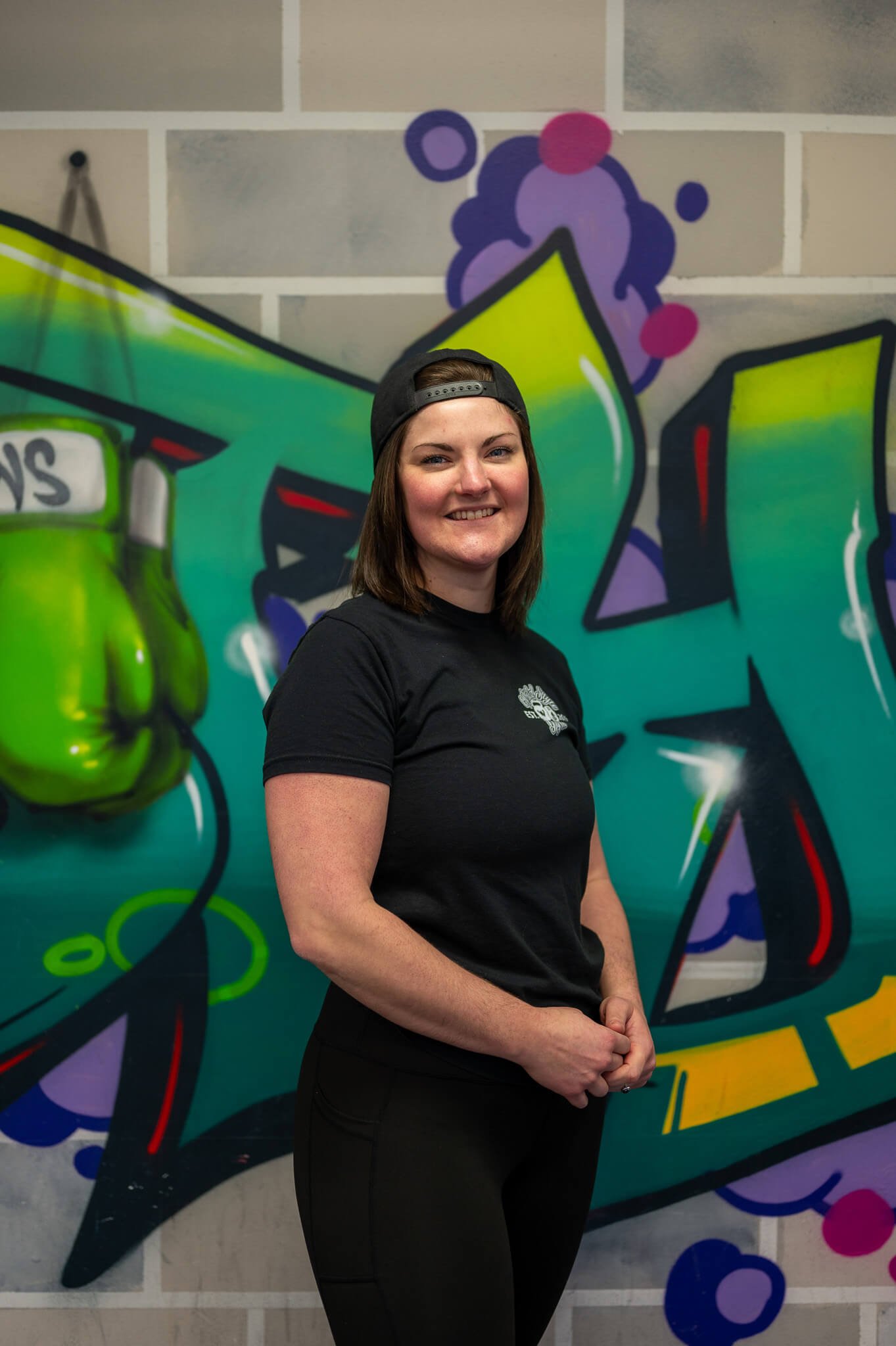Coach Maggie at WildStyle Gym in Snohomish, WA, showcasing strength, confidence, and leadership in the WildStyle training community.