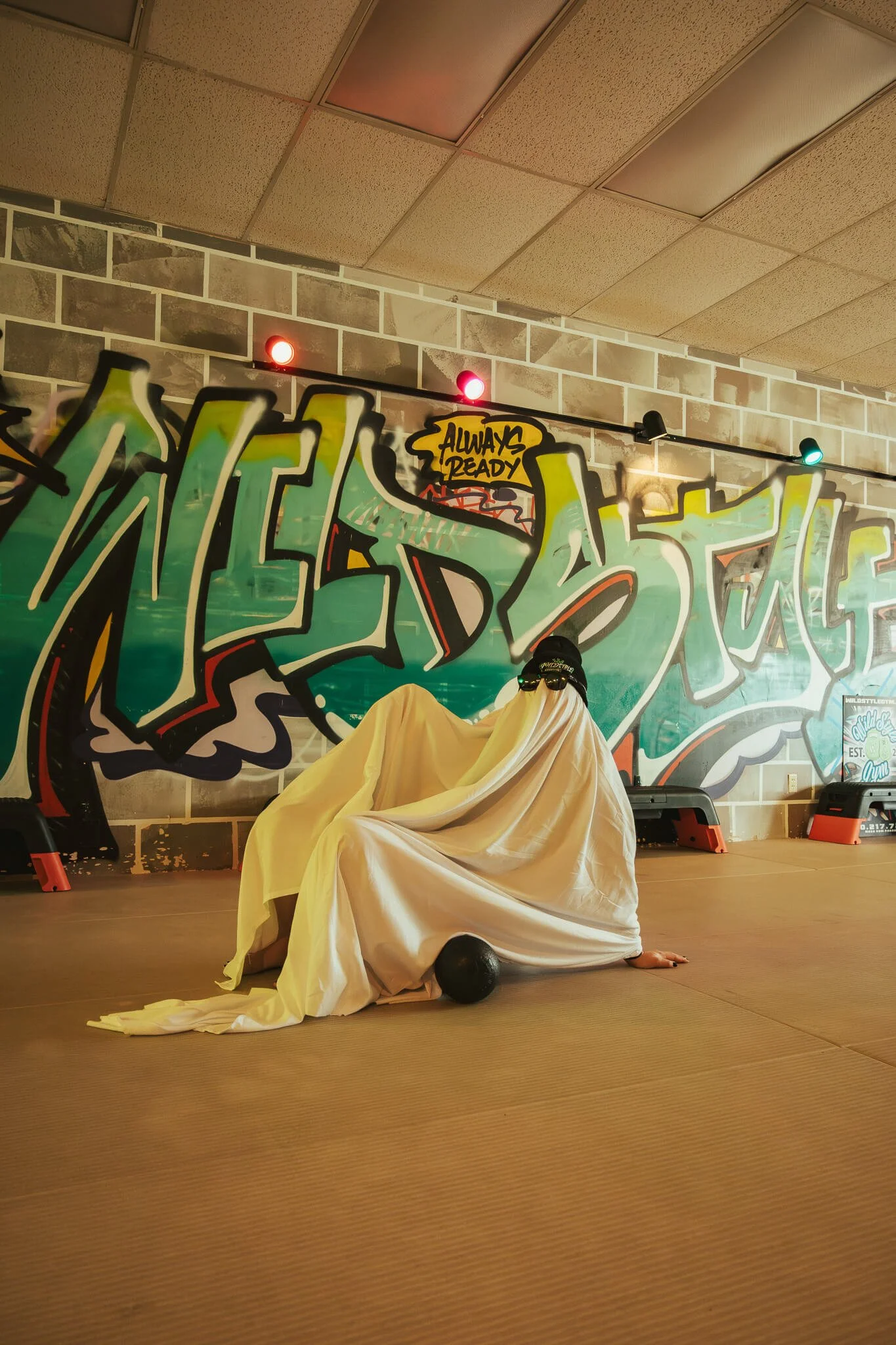 Warrior Flow mobility training at WildStyle Gym in Snohomish, WA, featuring creative recovery work using a Rollga roller to improve flexibility and body awareness.