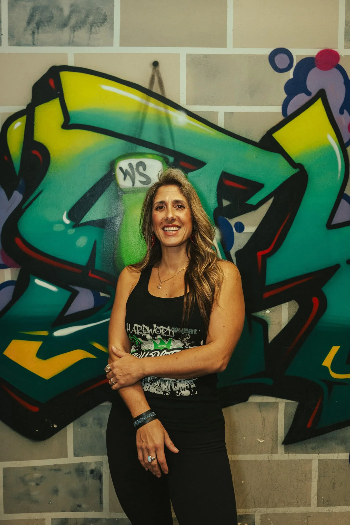 Sara, co-founder and coach at WildStyle Gym in Snohomish, WA, leading fitness and martial arts training with confidence and community focus.
