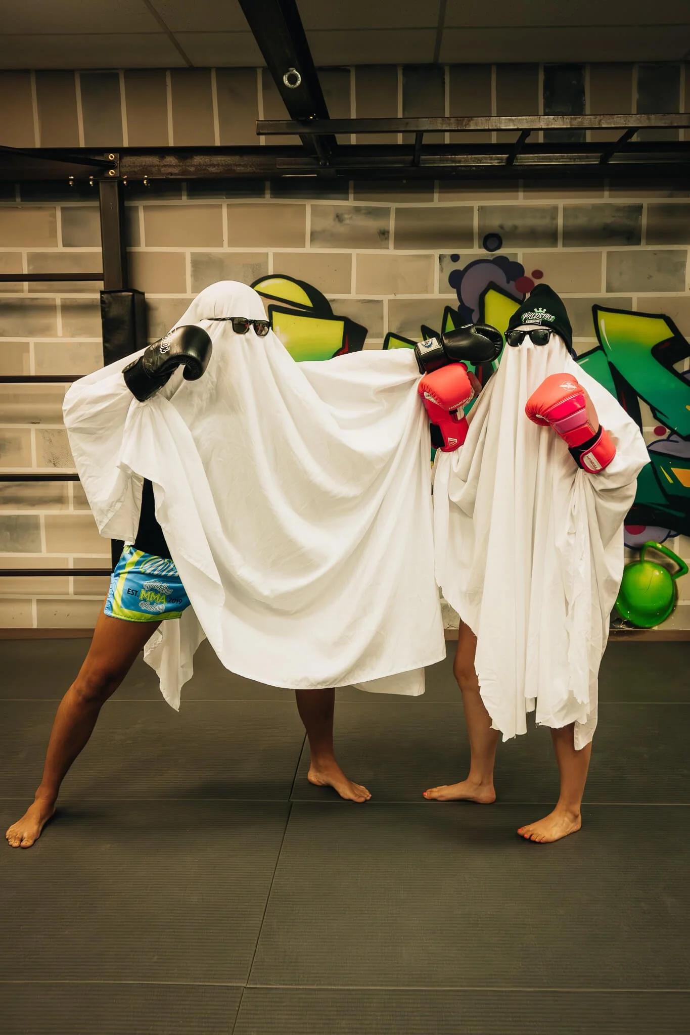 WildStyle Gym members showcasing the fun, inclusive community culture through playful training moments that balance hard work, connection, and enjoyment inside the gym.