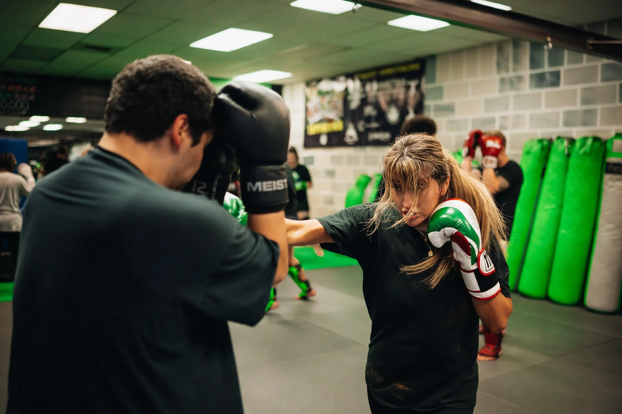 Adult kickboxing coaching session at WildStyle Kickboxing Academy in Snohomish, WA, focused on striking technique and confidence.
