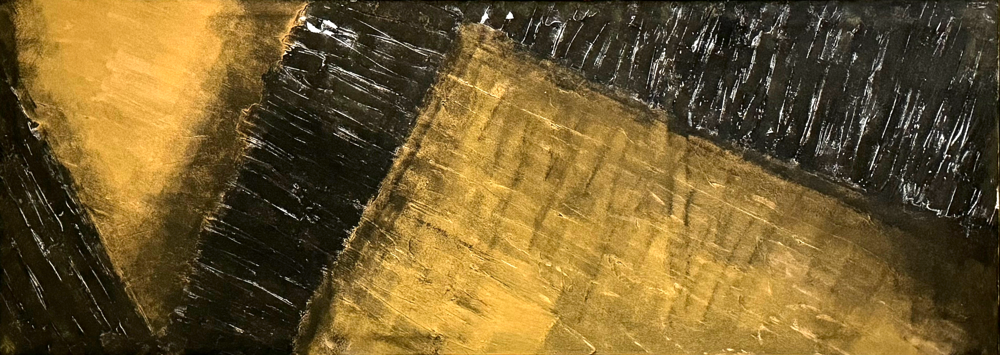 Close-up of a textured abstract painting with black and gold rectangular shapes and bold brushstrokes.