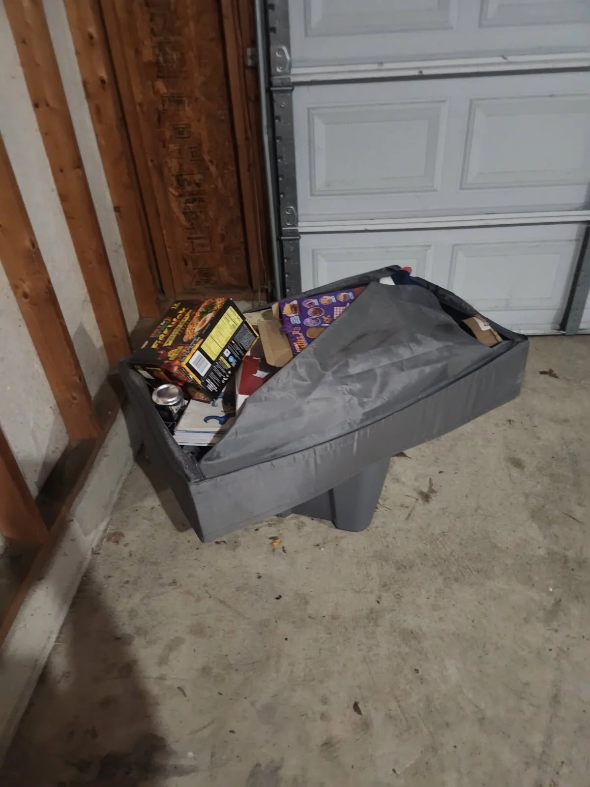 Quantico PCS move cleanup — household items staged in the garage.