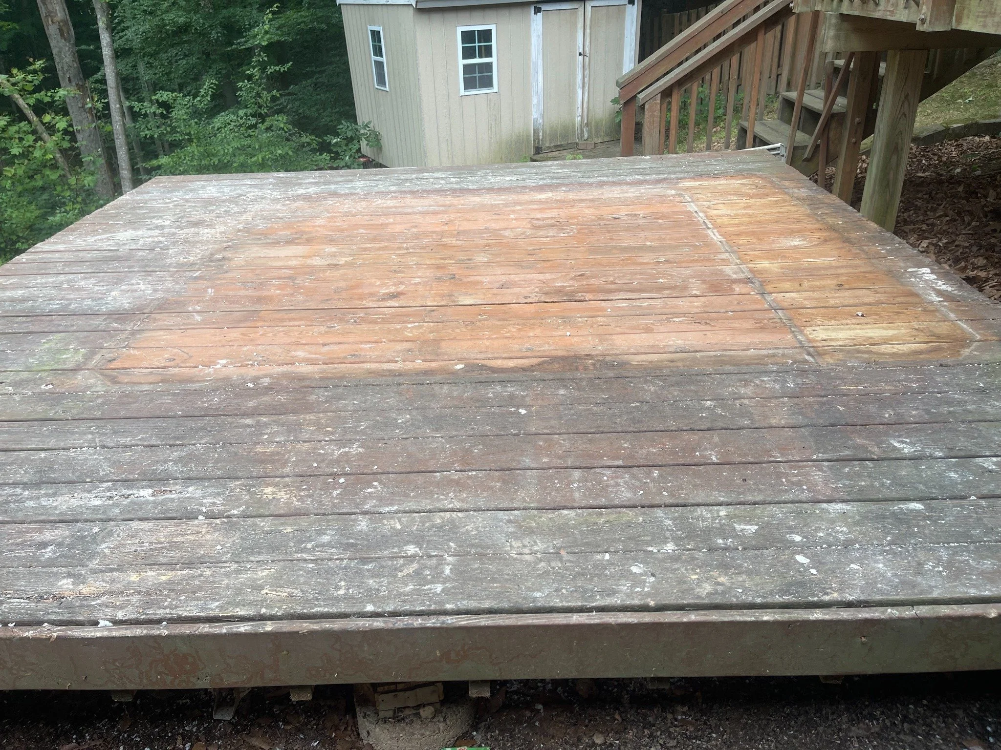 Hot tub removal — after, showing the deck with the tub removed.