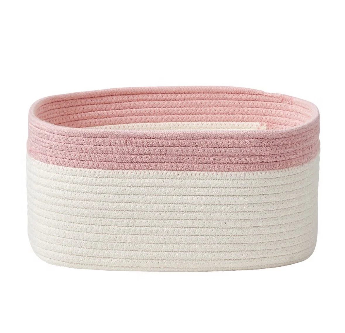 A fabric storage basket with a pink top and cream-colored base, made of ribbed material.