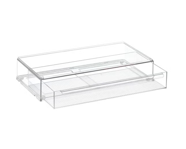 Clear plastic drawer with multiple compartments for storage.