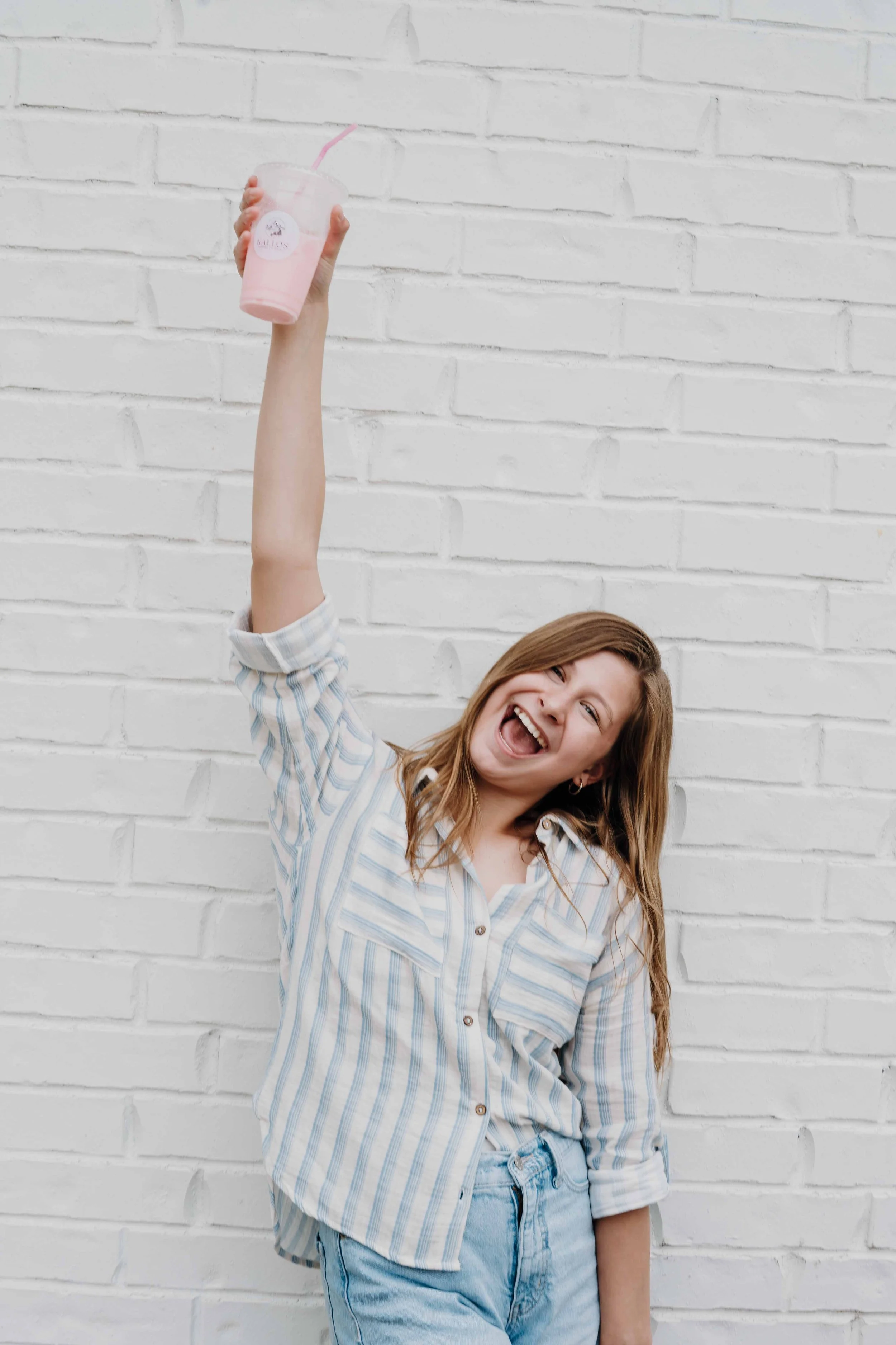 girl with drink, teen girl, happy, party drinks, mobile drink, catering, hands up.