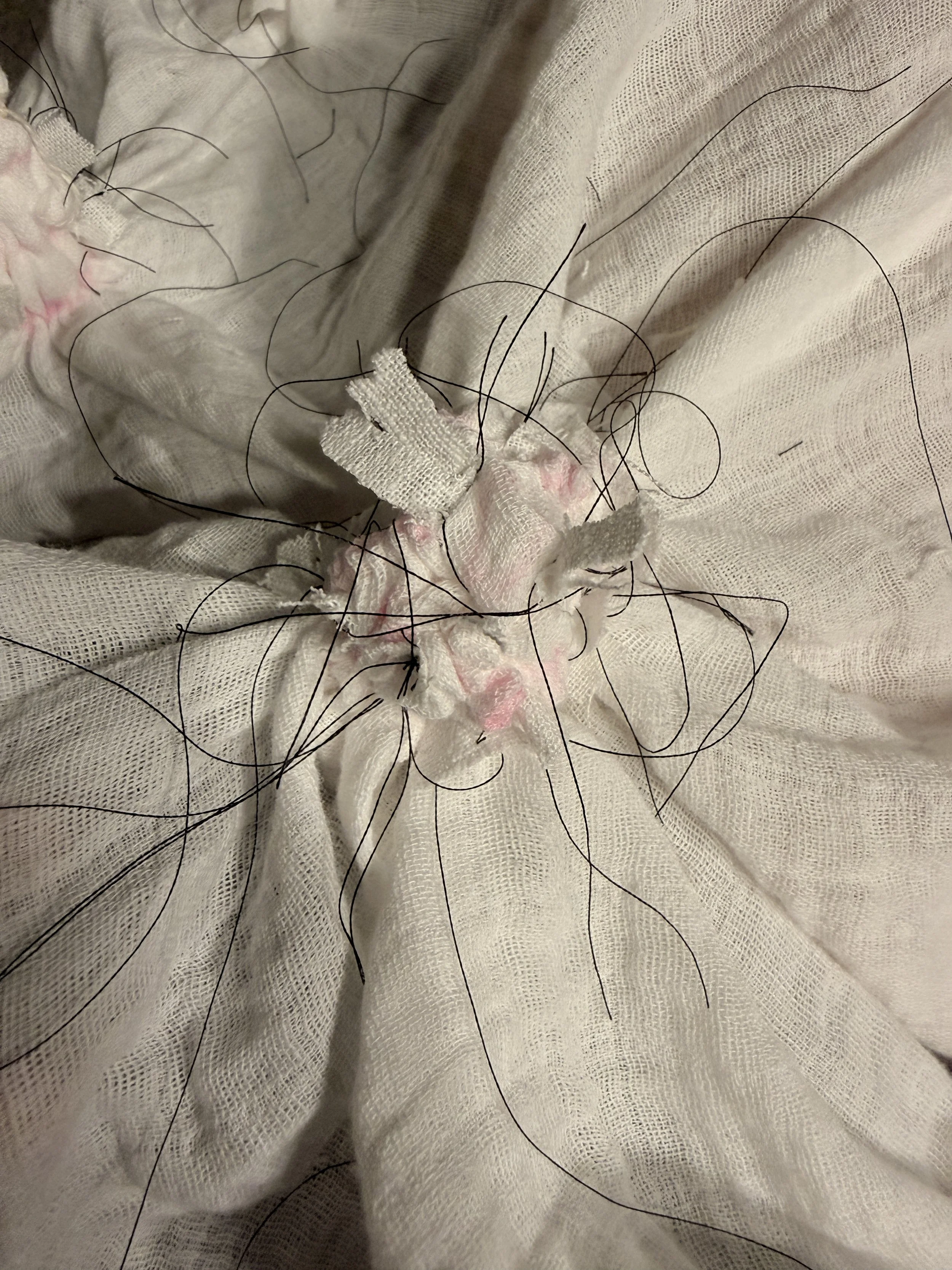 The previous starfish resist design, now with threads tightened.  It doesn't look like anything other than a lump of fabric with many thread ends.