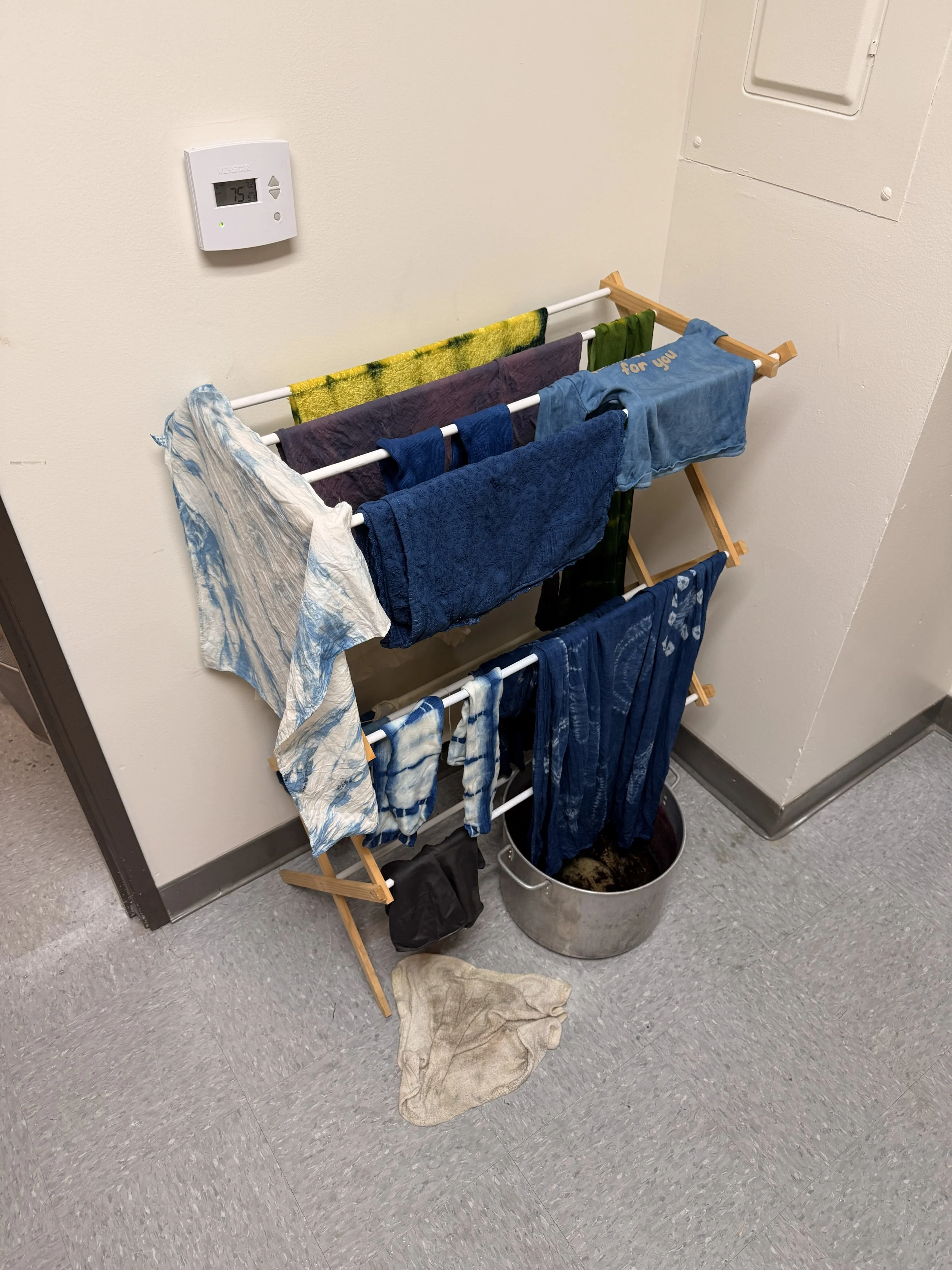 The same drying rack but with additional items.  The color difference is subtle, but the blues are lighter compared to the first photo.
