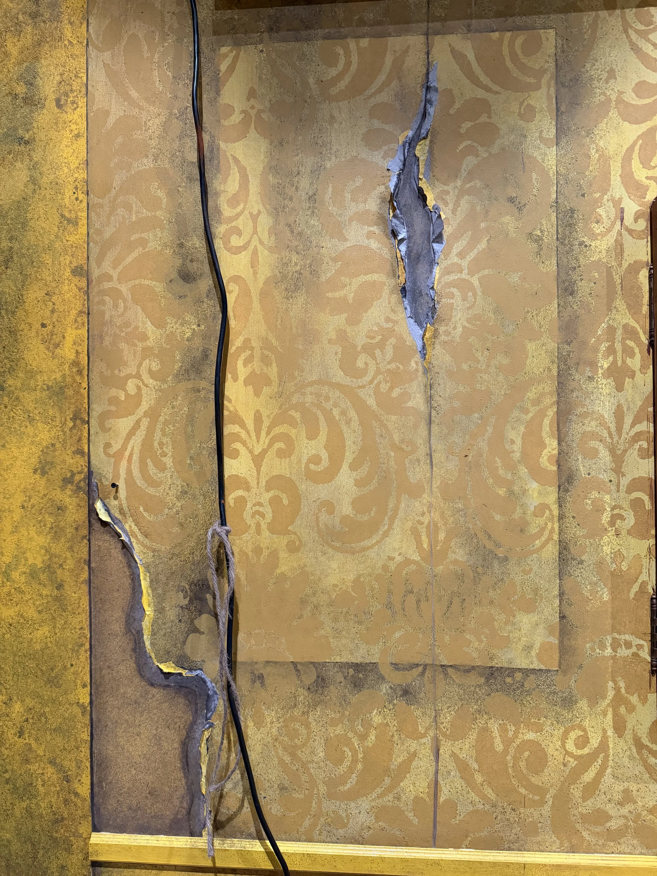 Faux wallpaper and rips