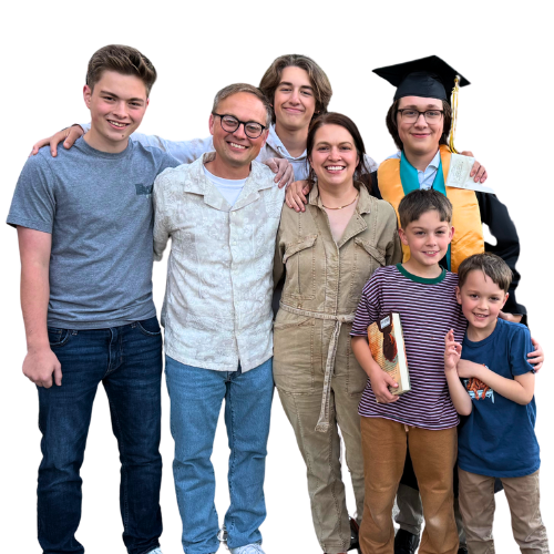 The Miller family grouped together smiling