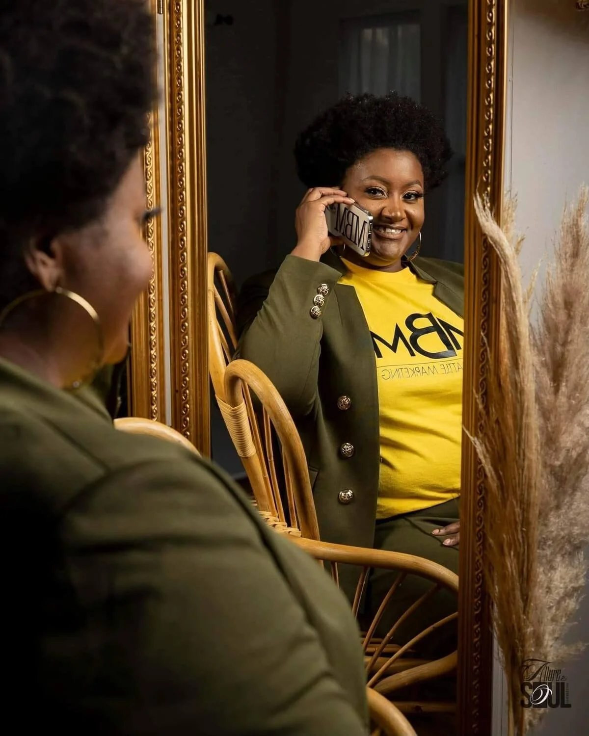 african-american-woman-holding-phone-to-face