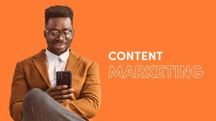 african-american-man-holding-phone-content-marketing