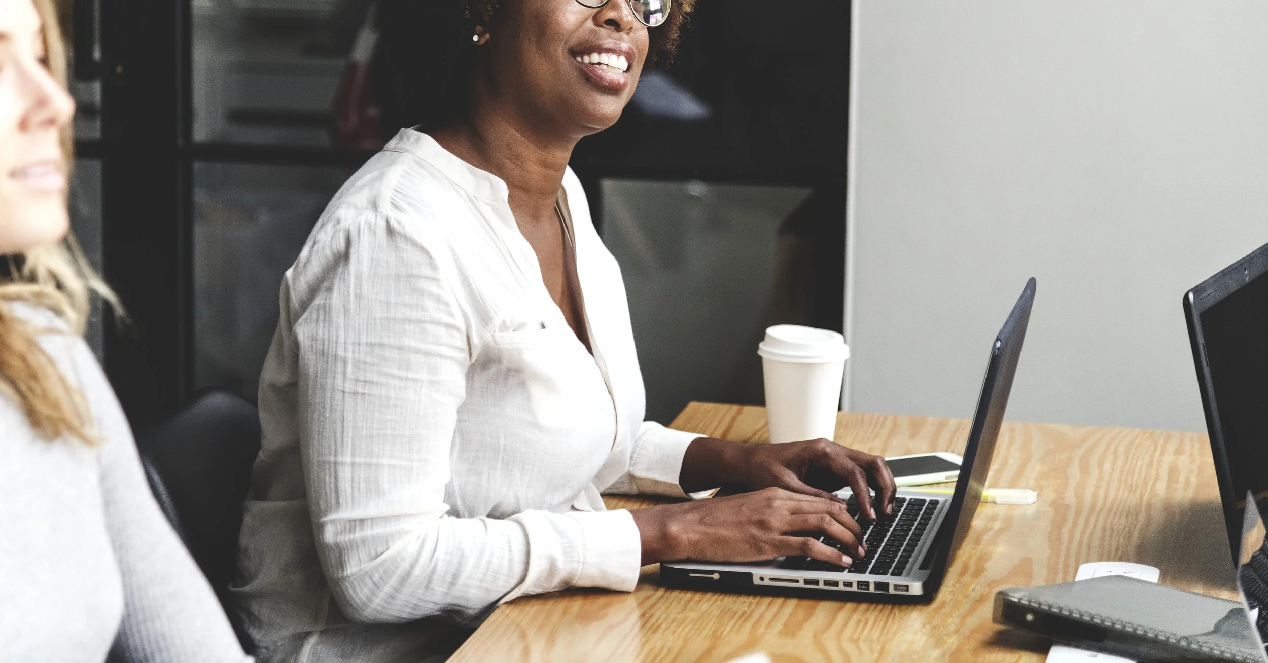 business-people-working-laptops-meeting