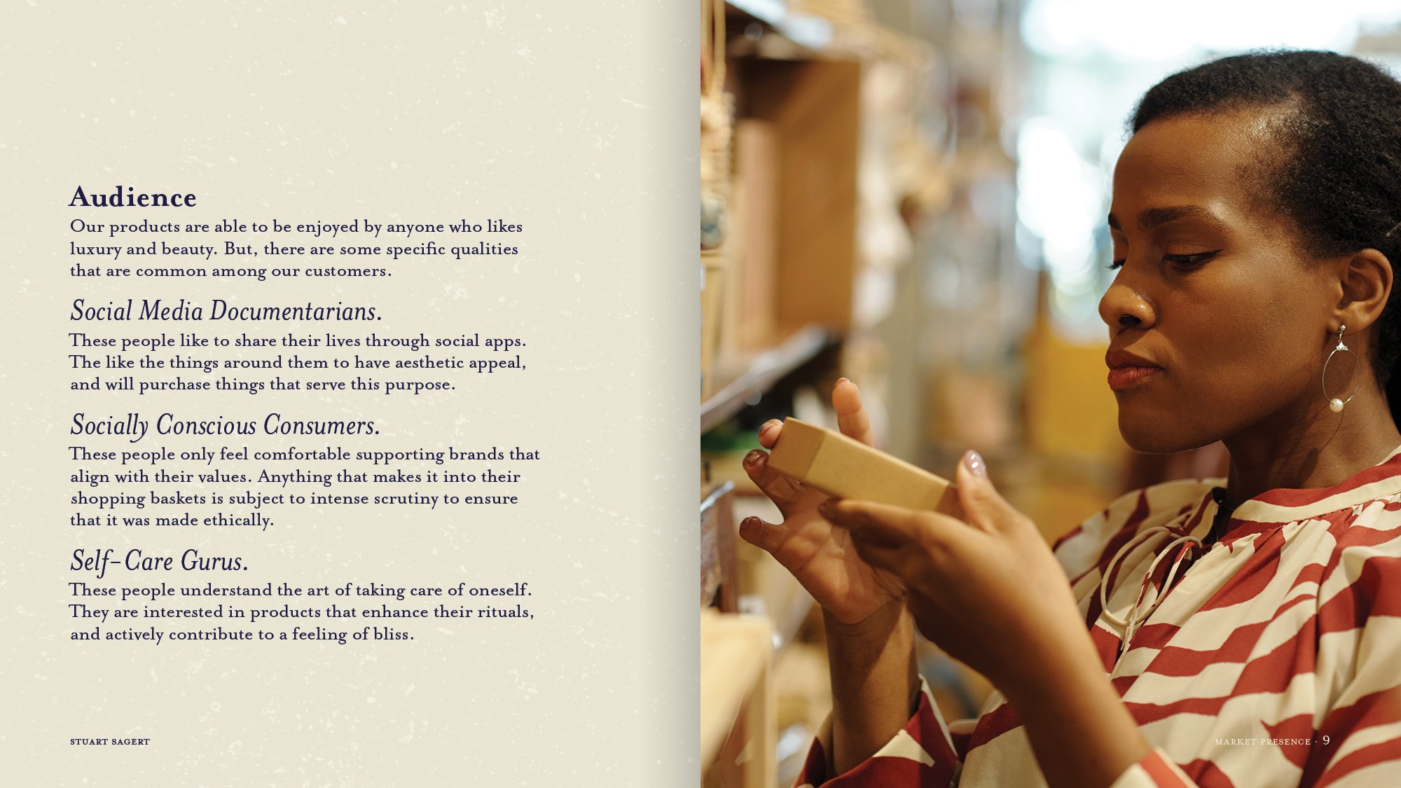 A woman with dark hair and earrings is holding and examining a bar of soap in a store.