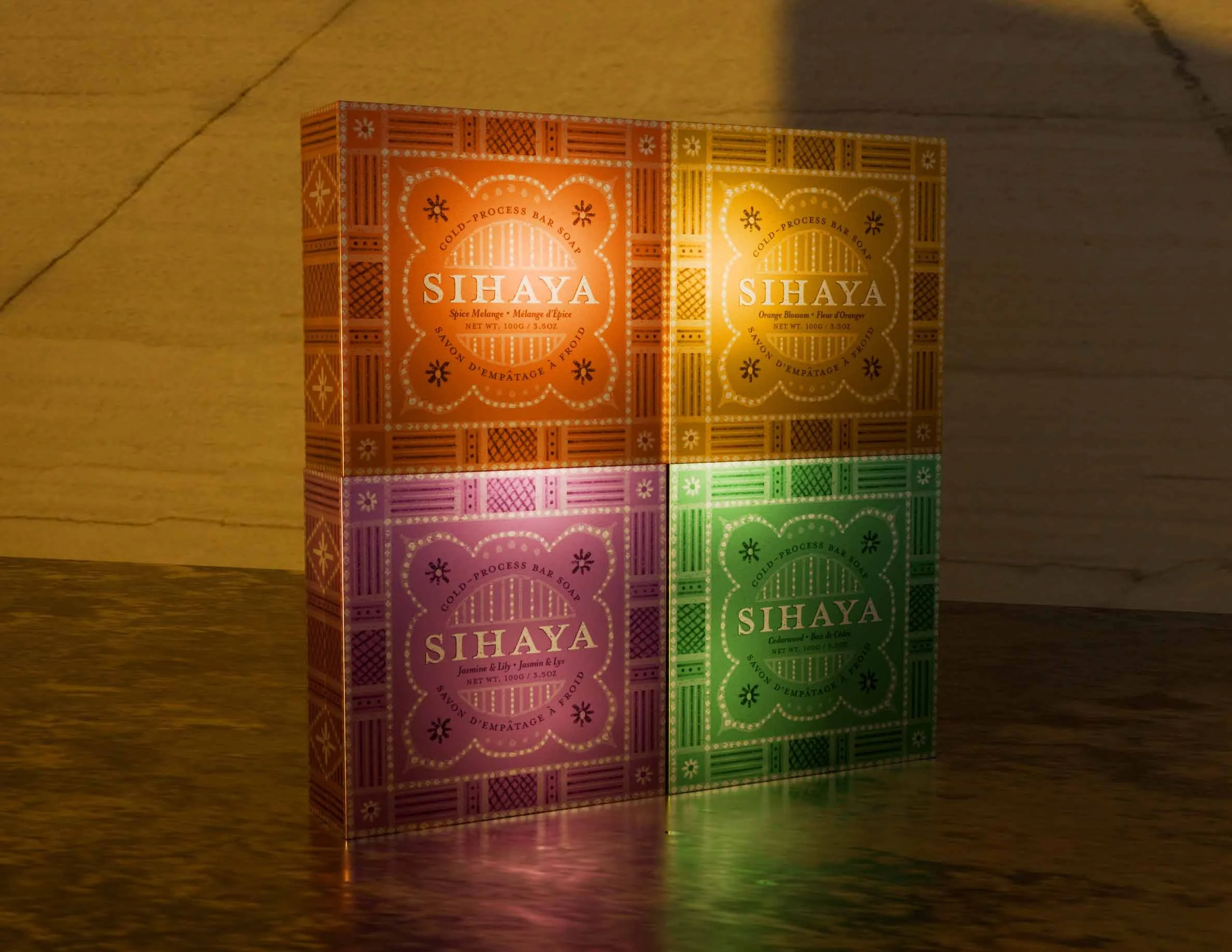 Colorful box set of four Sihaya soap bars arranged in a 2x2 grid, each with intricate patterns and labels in orange, yellow, pink, and green.