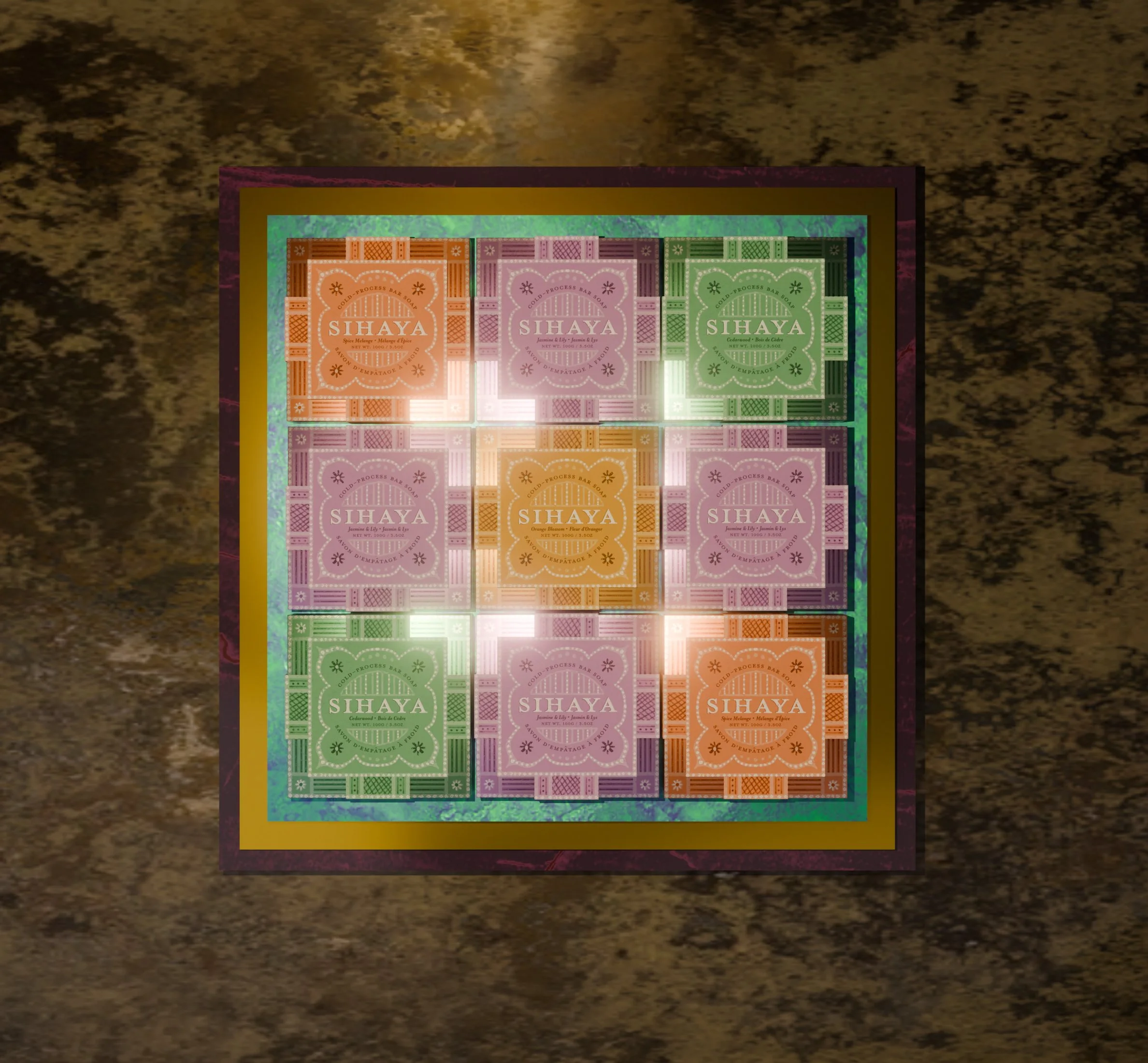 Colorful square grid of nine soap packages with the brand name 'Sihaya' on each, arranged in a 3x3 pattern, with a decorative border and a textured background.