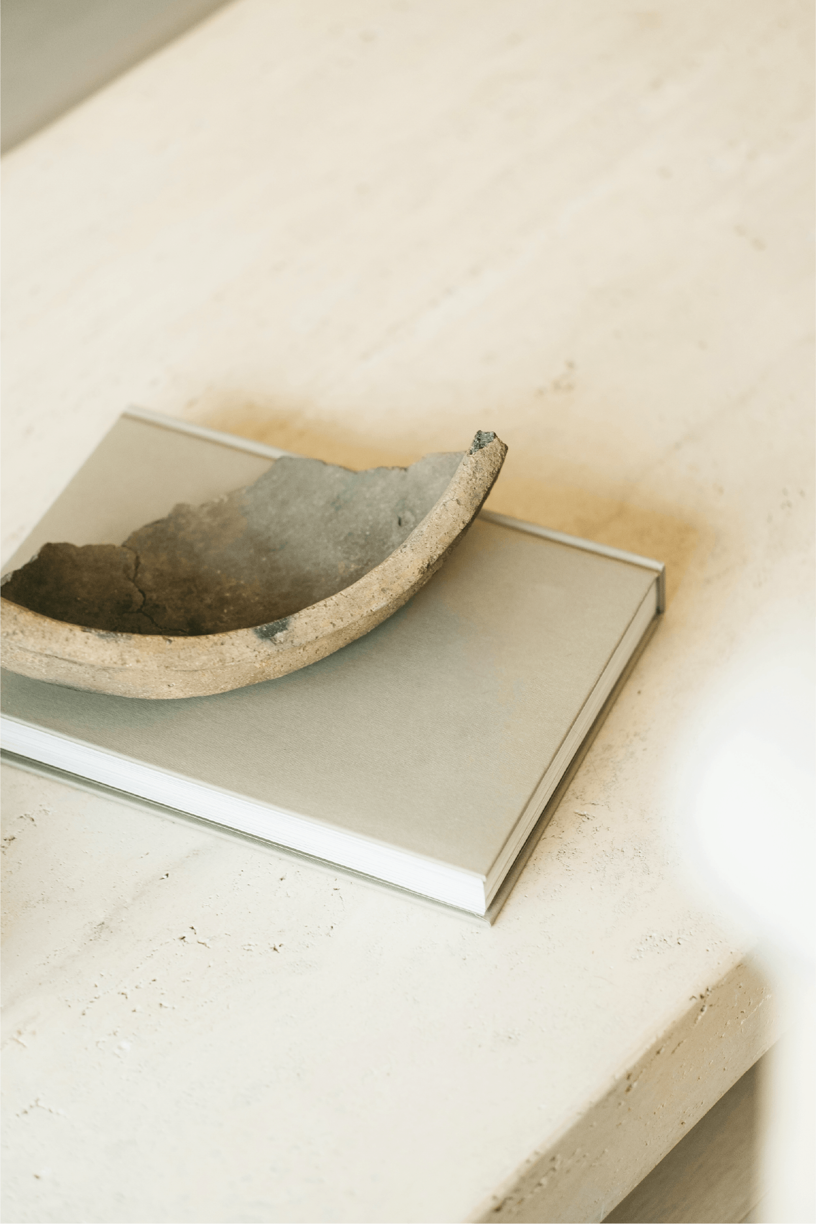 Journal, coffee, and notebook representing a calm space for reflection.