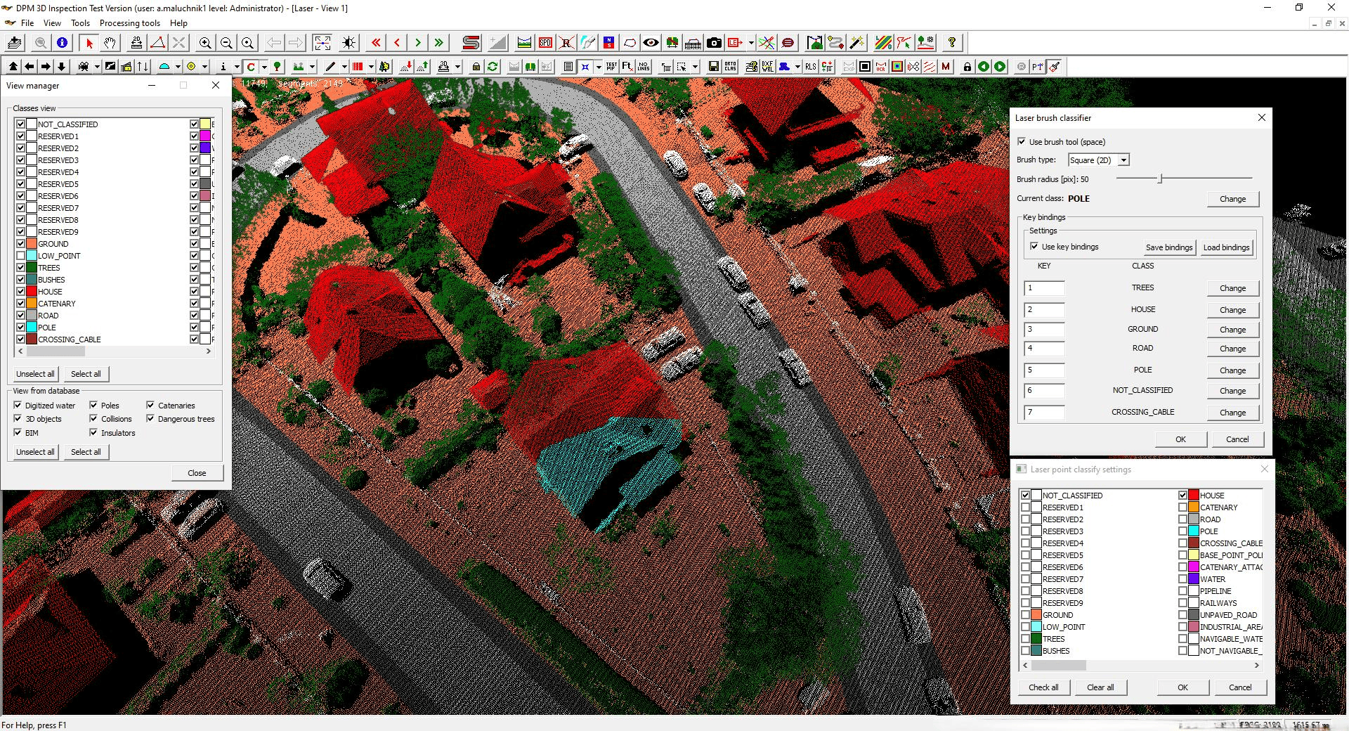 A 3D point cloud image of a residential neighborhood showing houses, a curved road, cars, trees, and vegetation, with various objects classified and color-coded.