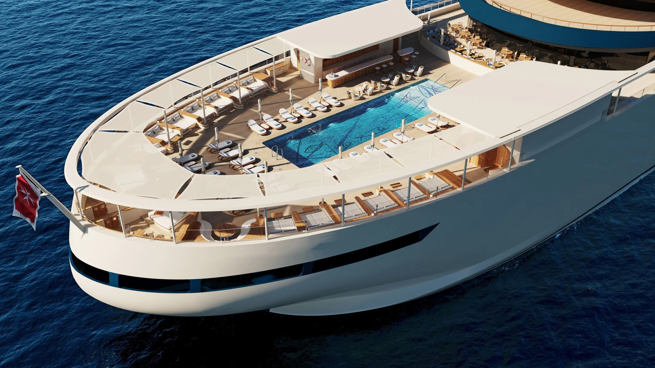 Aerial view of a luxurious yacht with a swimming pool, sun loungers, and shaded lounge area on deck, floating in the ocean.