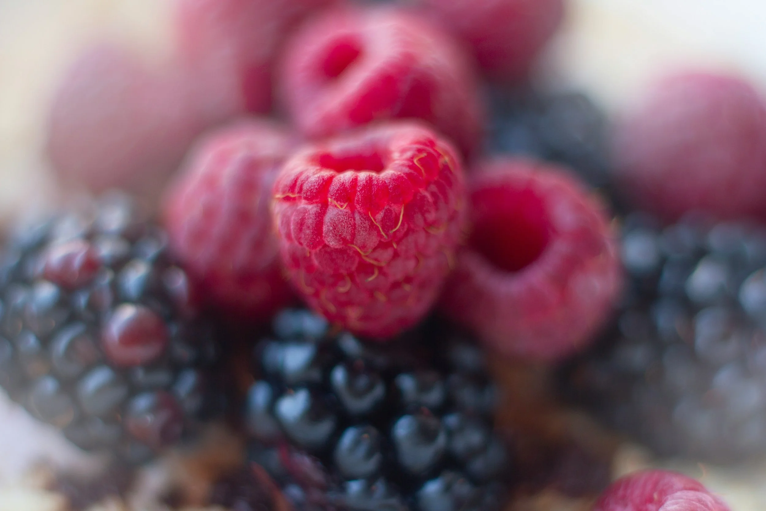 Close-up of raspberries and blackberries.