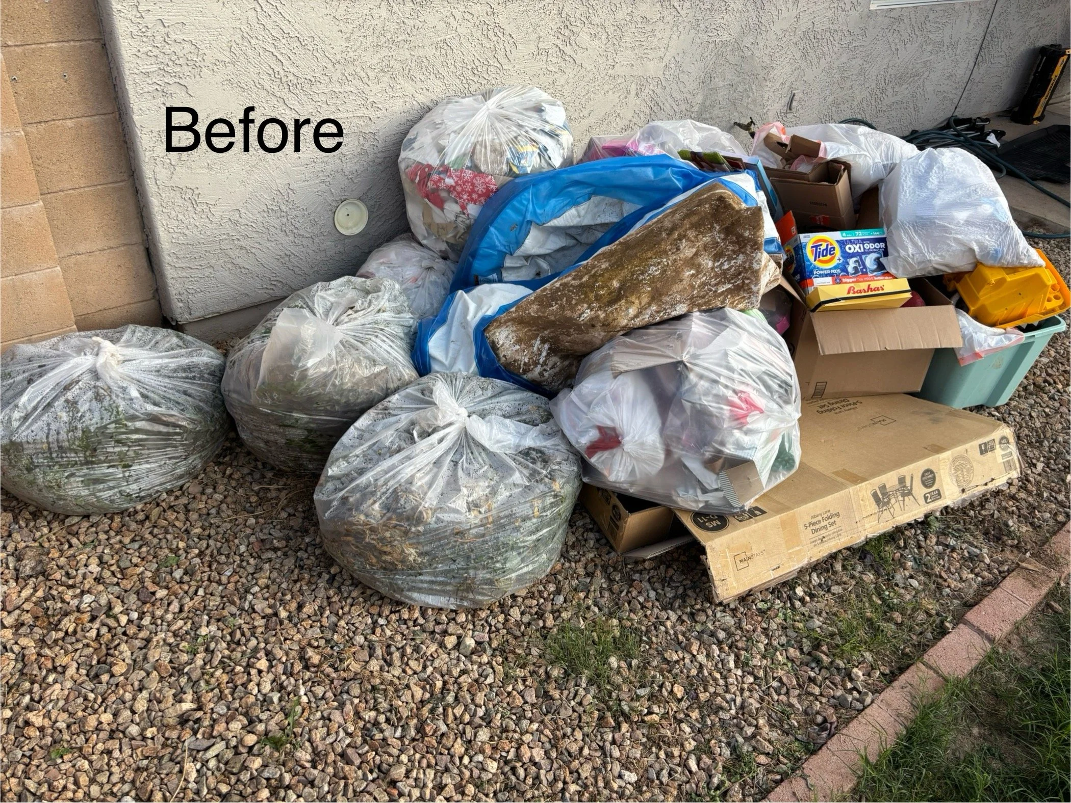 Piles of trash bags and boxes outside a building, labeled 'Before', indicating a cleanup or decluttering scene.