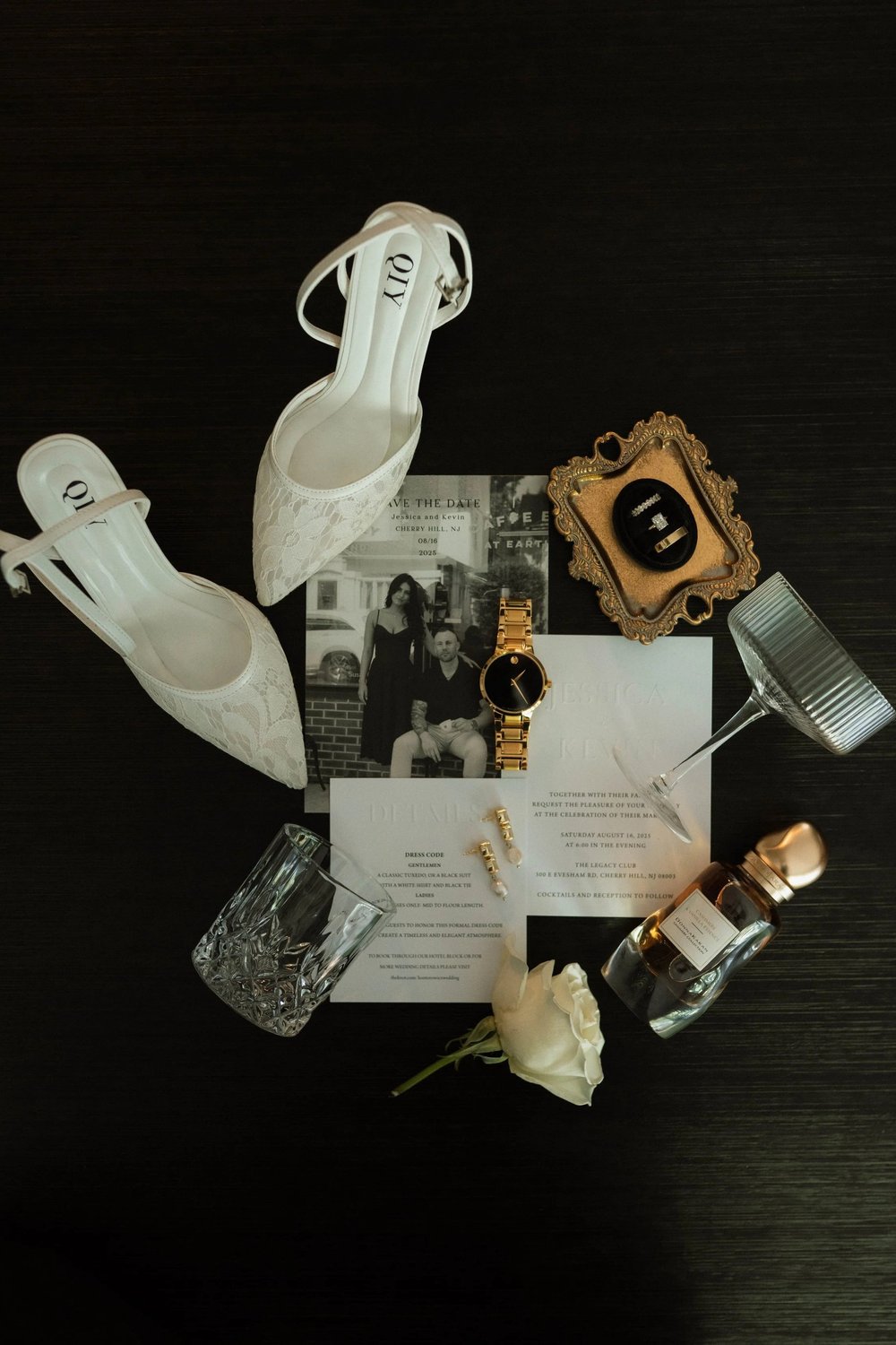Wedding rings, invitation and heirloom details