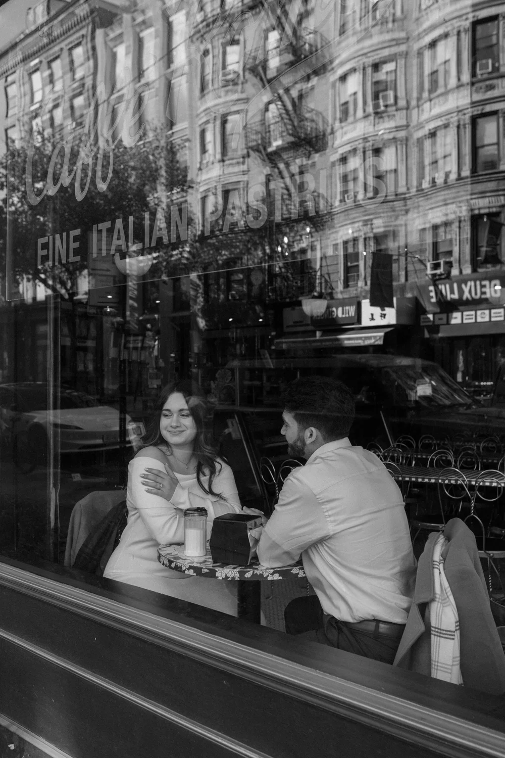 Couple seen through a New York restaurant window