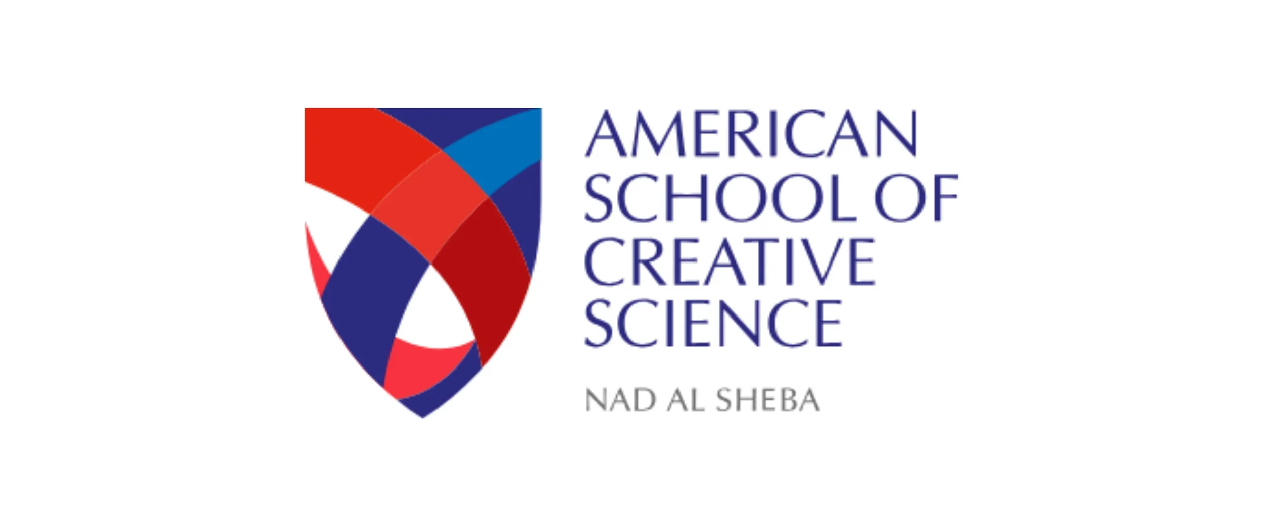 Logo of the American School of Creative Science featuring a multicolored shield emblem with red, blue, and white shapes next to the text 'American School of Creative Science' and 'Nad Al Sheba'.