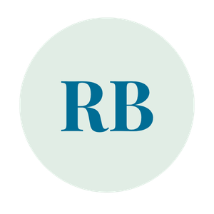 A white circular badge with the letters 'RB' in blue in the center.