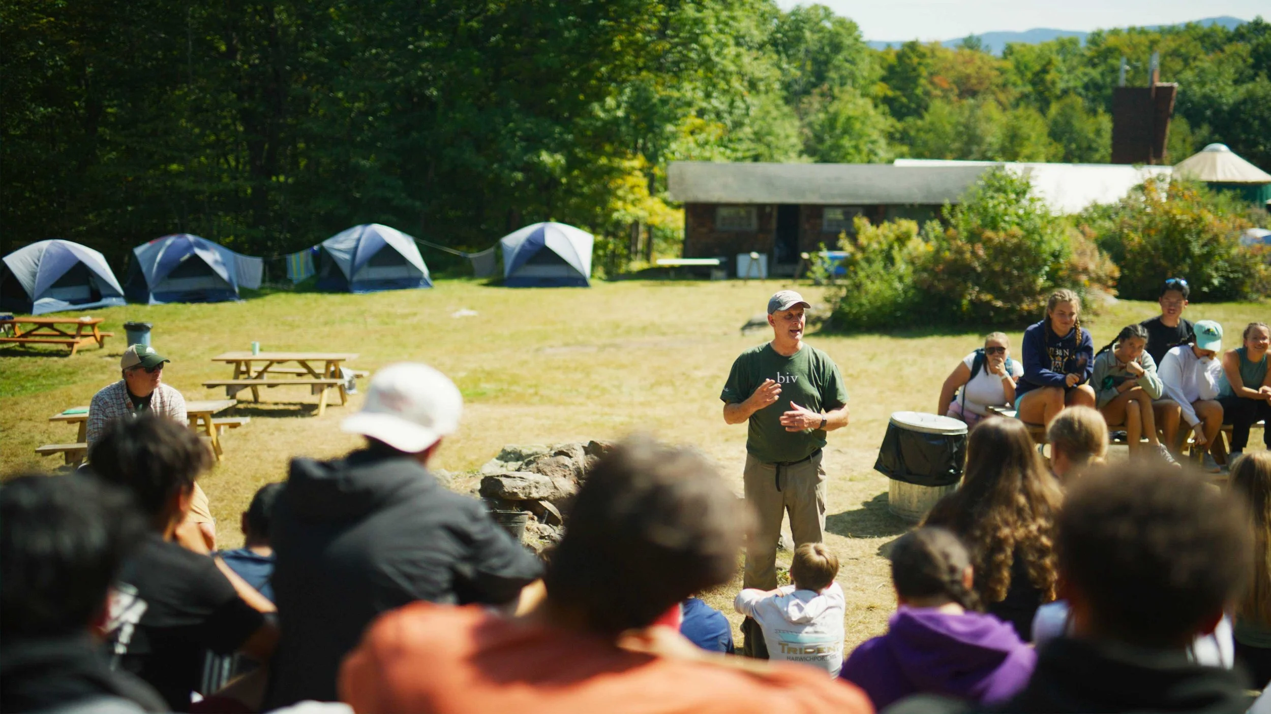 A teacher speaks to a class about Bivouac program