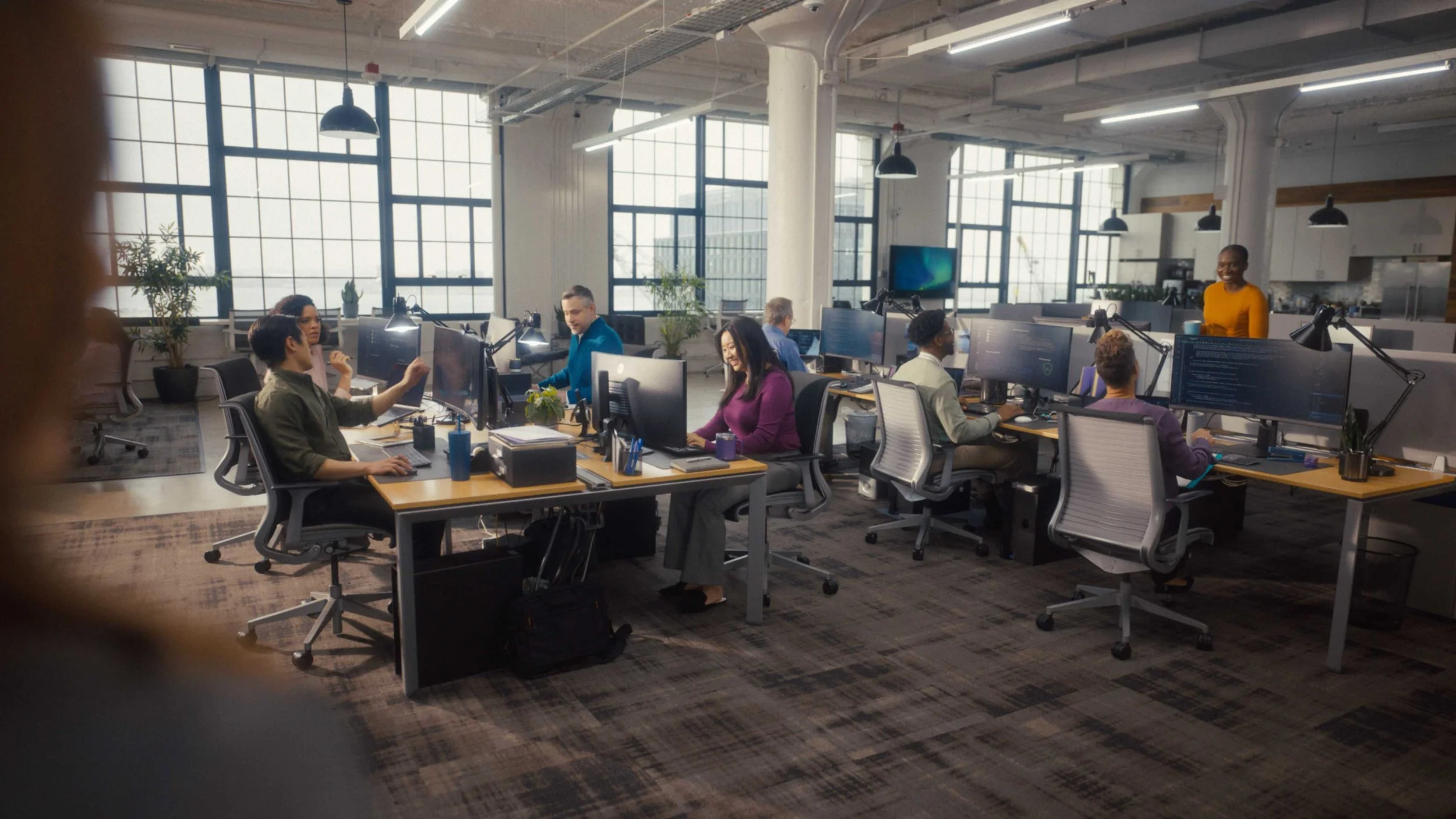 A bright and busy office space video in a Dynatrace commercial