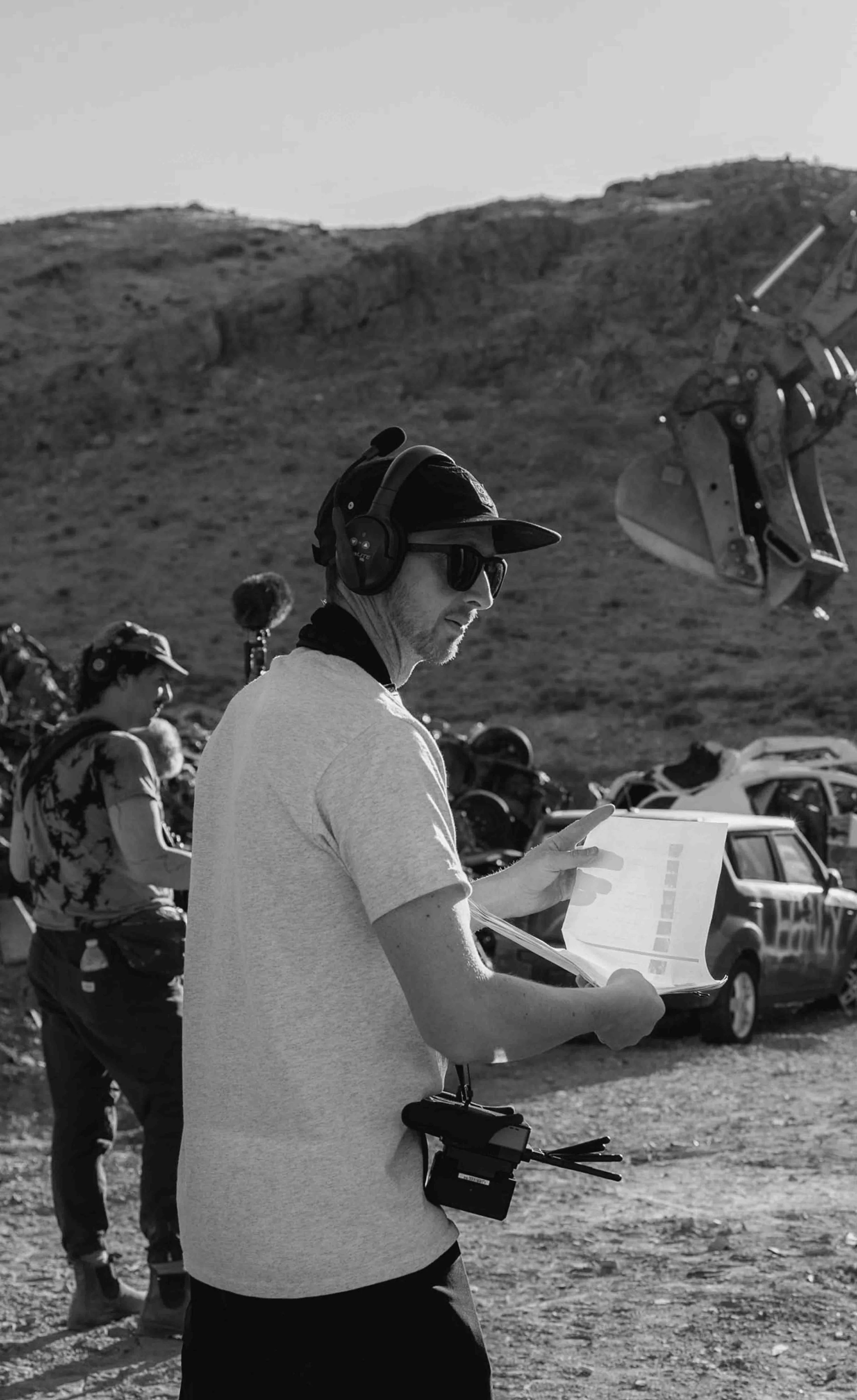 Behind the scenes photo from a shoot in Las Vegas as Kyle looks over his shot list