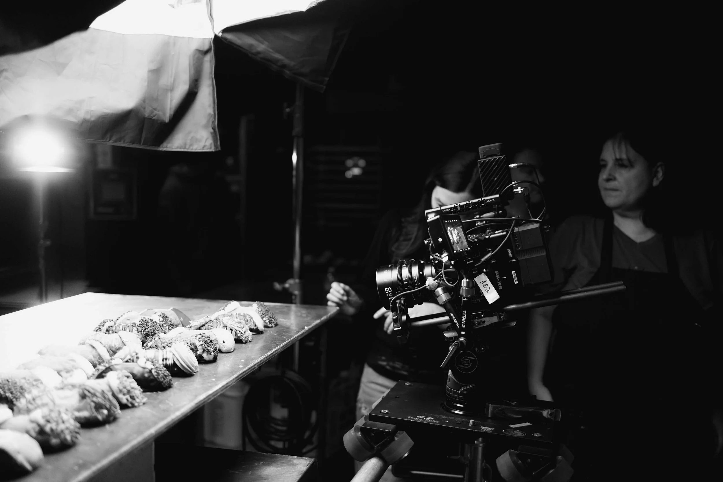 Behind the scenes photo of a Red V Raptor camera filming at Mike's Pastry