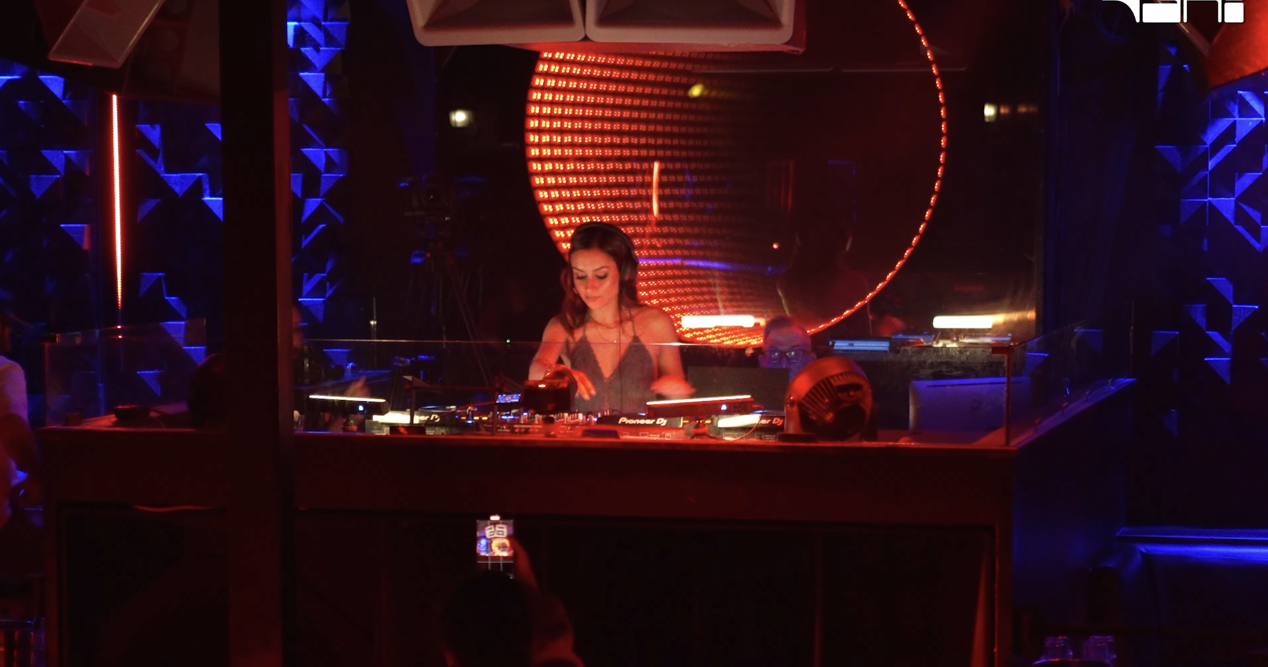 Vani Dewan performing at Audio SF with red and blue lighting opening for ZEEMUFFIN.