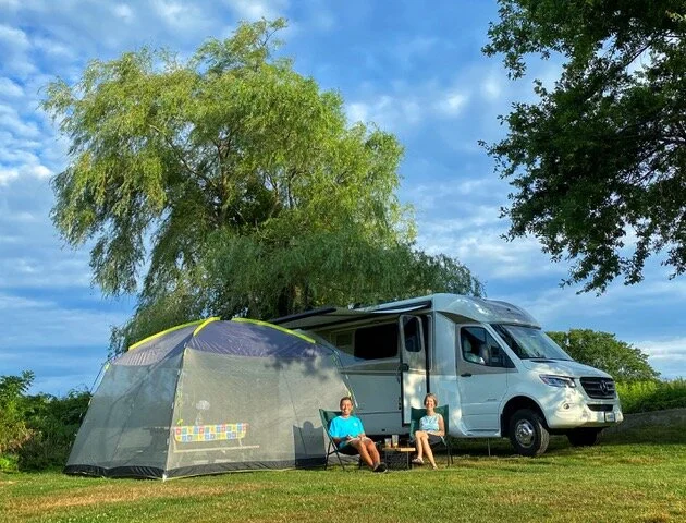 Amy and I enjoying the great outdoors with the comforts of home in RI last summer.