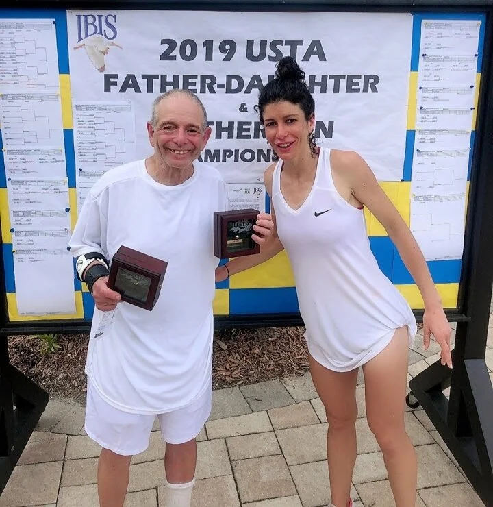 Champions Richie and his daughter Julia in 2019