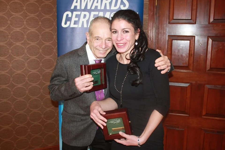 Rich and Julia with their gold balls
