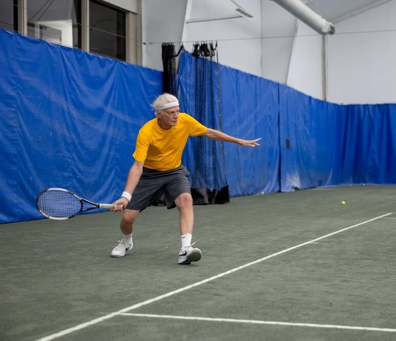 Bill Finger working on his game at the Raleigh Racquet Club