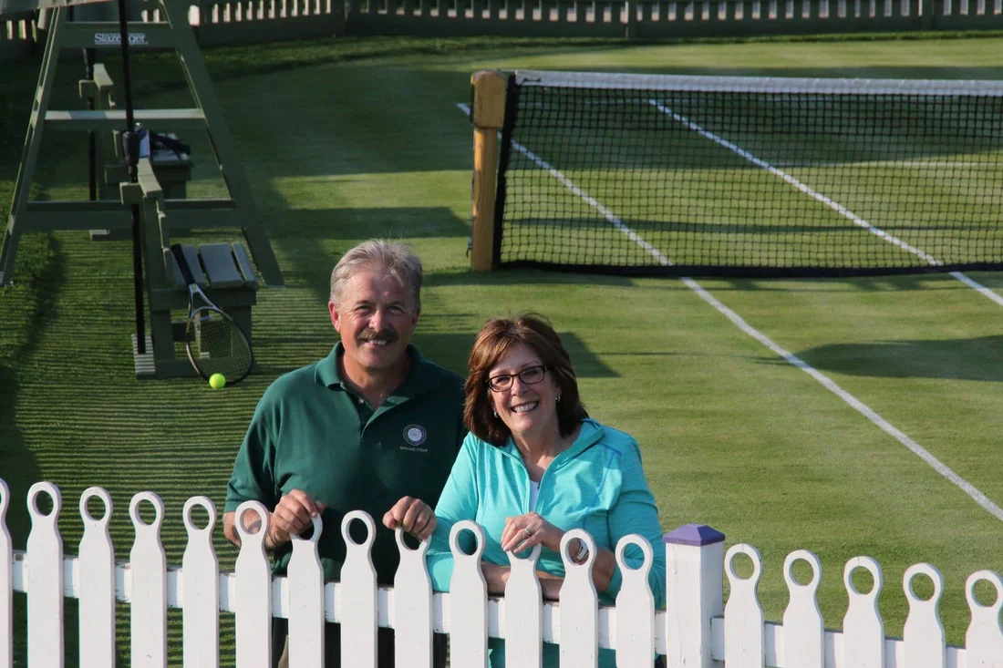 Mark and Denise Kuhn on their backyard court