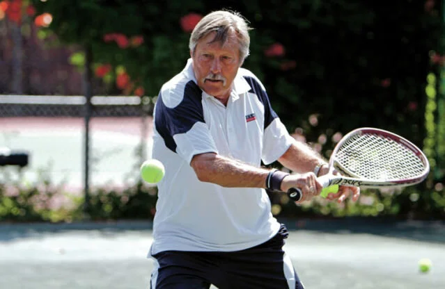 NSMTA President and USPTA Master Pro, Jimmy Parker on the court